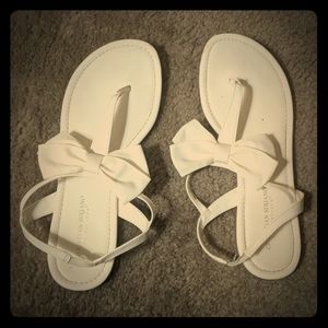 White sandals with bow